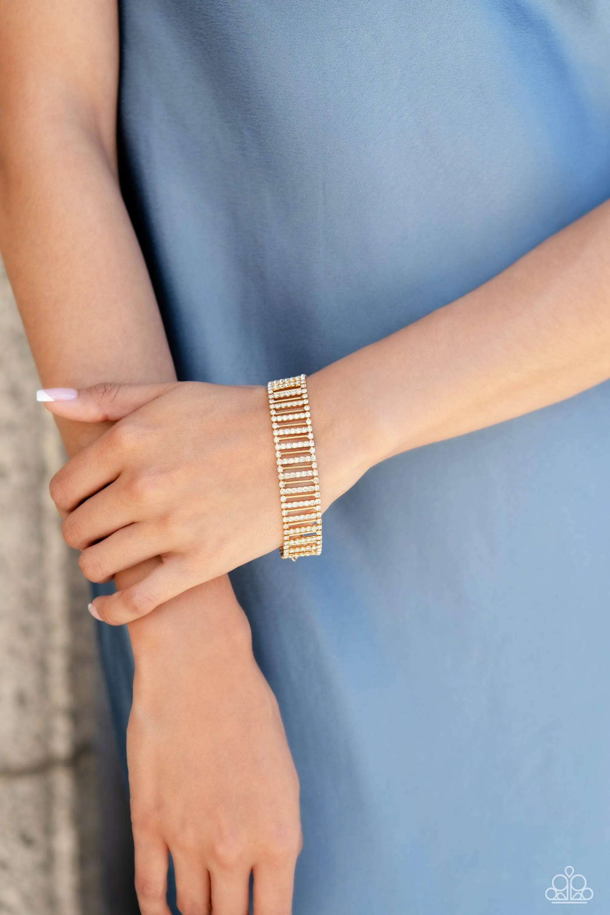 Elusive Elegance Gold & White Rhinestone Bracelet - Paparazzi Accessories