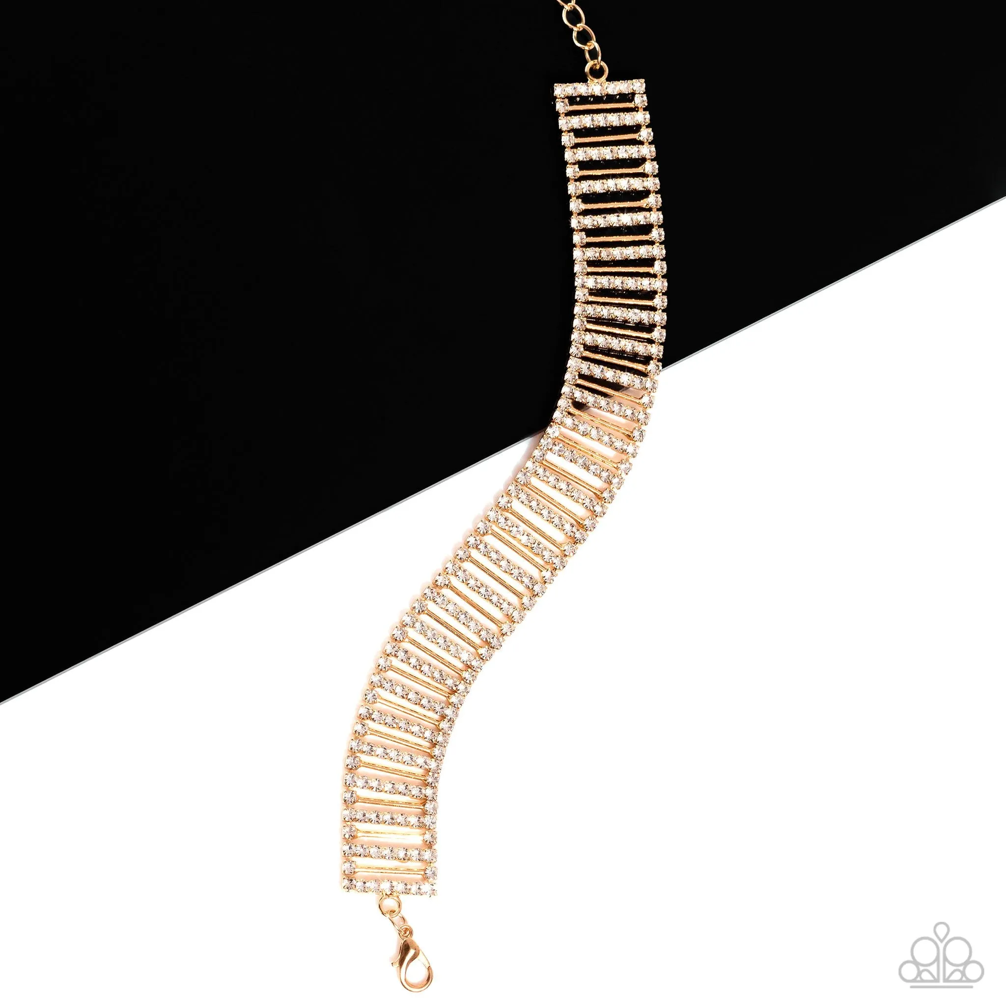 Elusive Elegance Gold & White Rhinestone Bracelet - Paparazzi Accessories